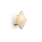 Brockton Alabaster Wall Lamp with a diamond-shaped shade against a neutral wall.