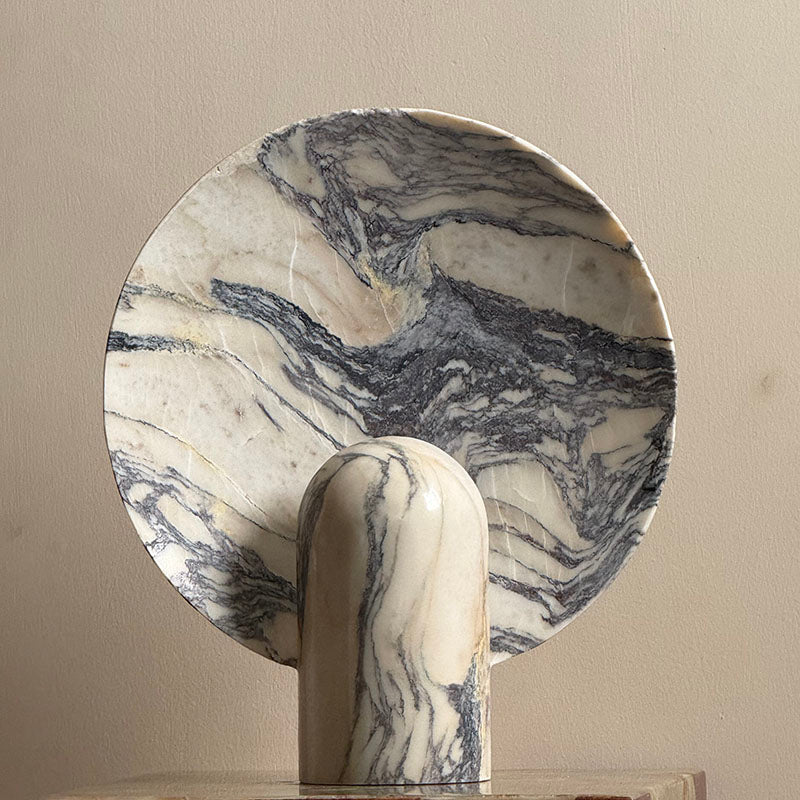 Side profile of the grey marble Fan Table Lamp.