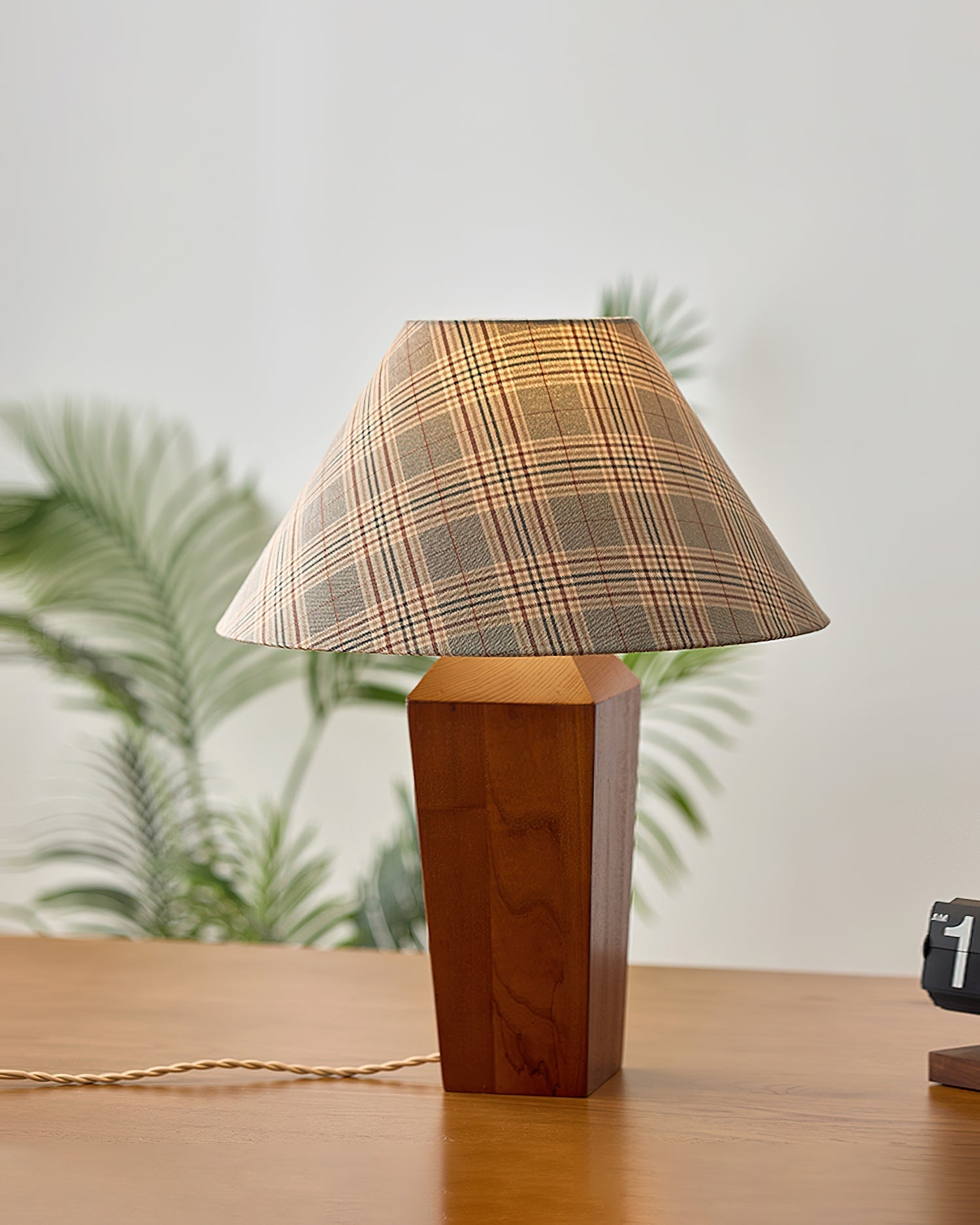 The lamp in a bedroom setting on a nightstand.