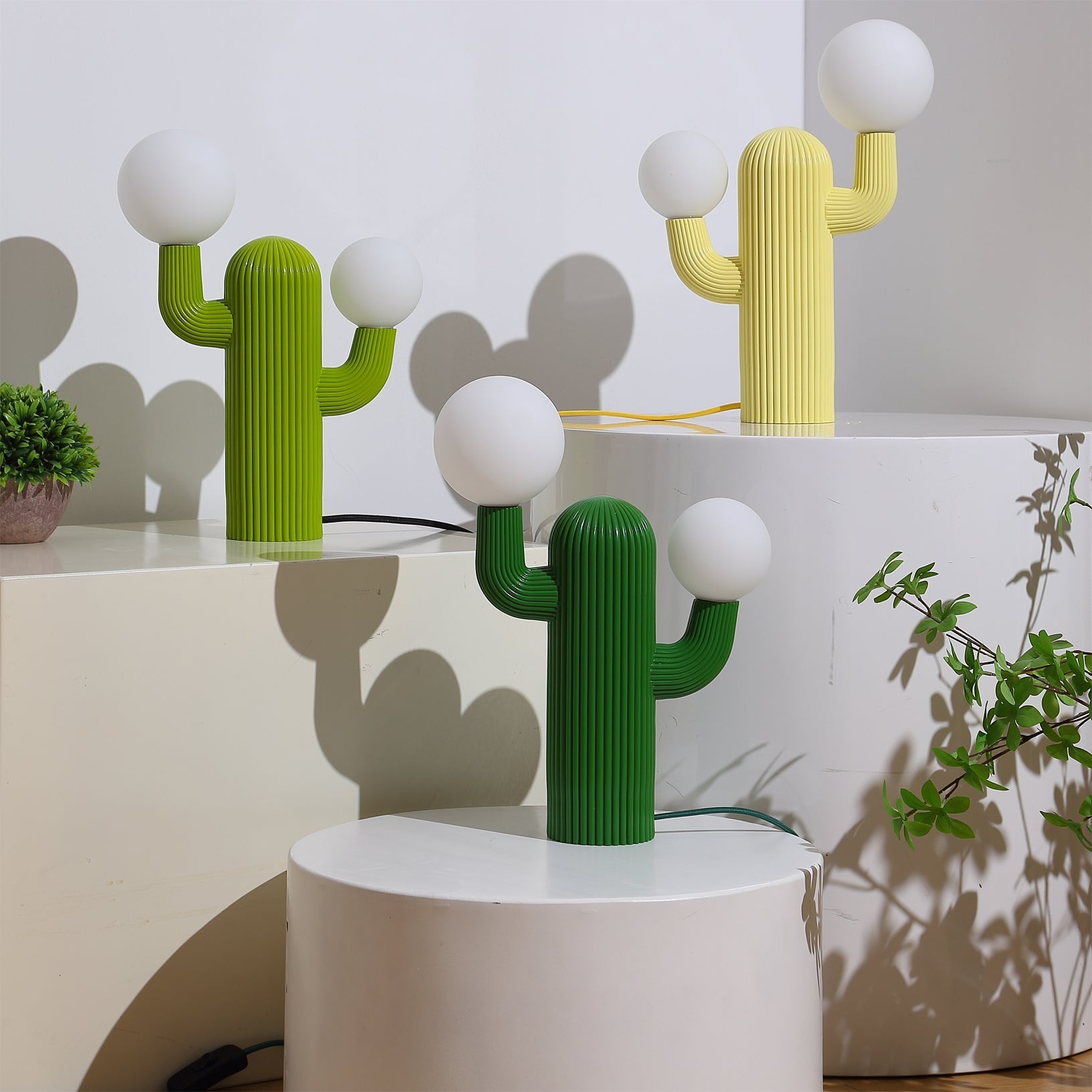 Light green Cactus Table Lamp shown from the side.