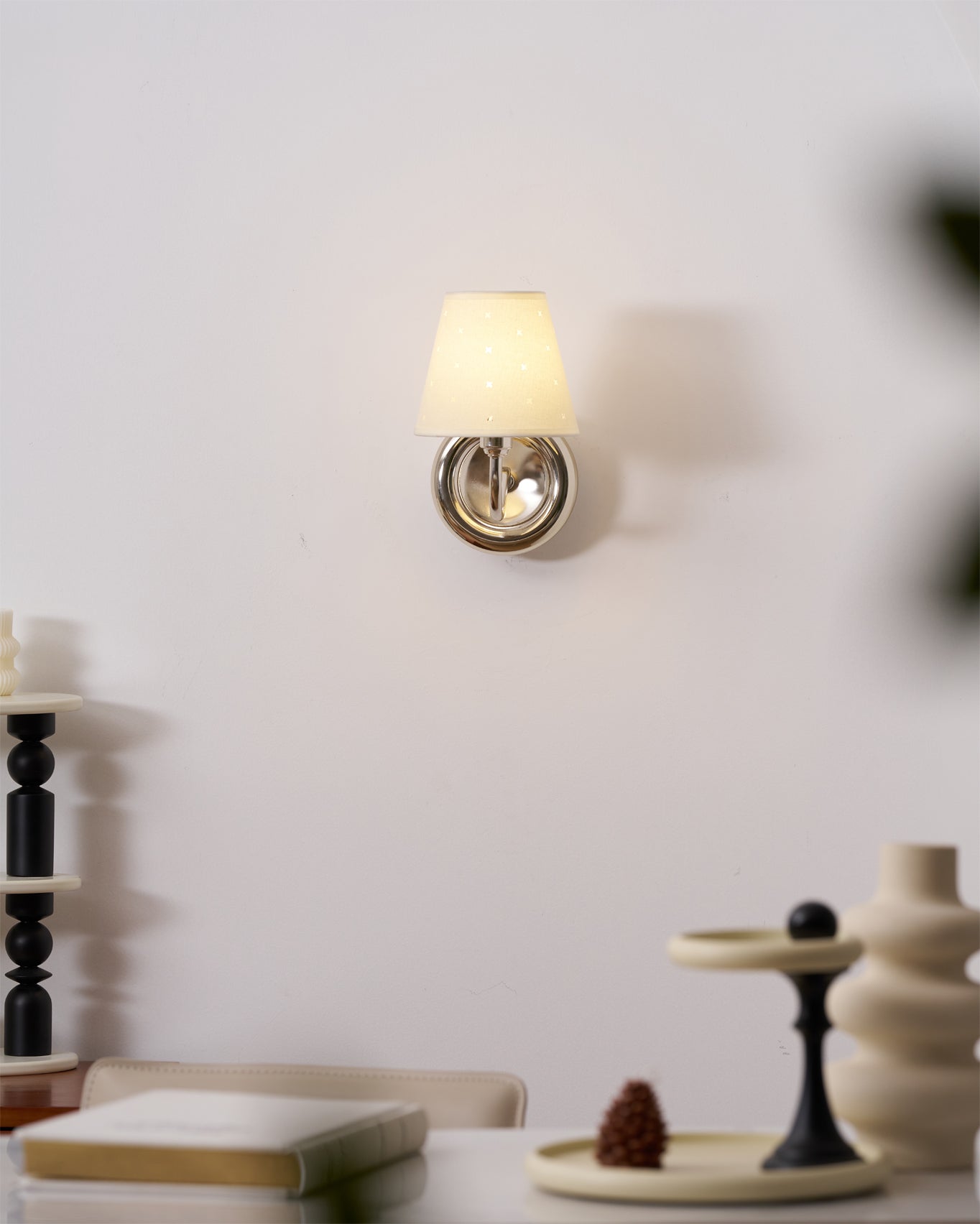 Side profile of the Caleb sconce showing the gooseneck curve.