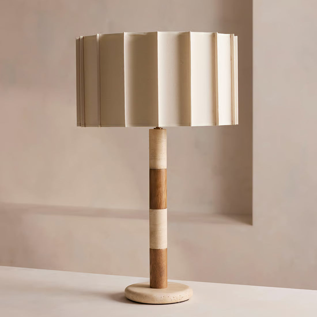Calypso Table Lamp shown in a modern living room setting.