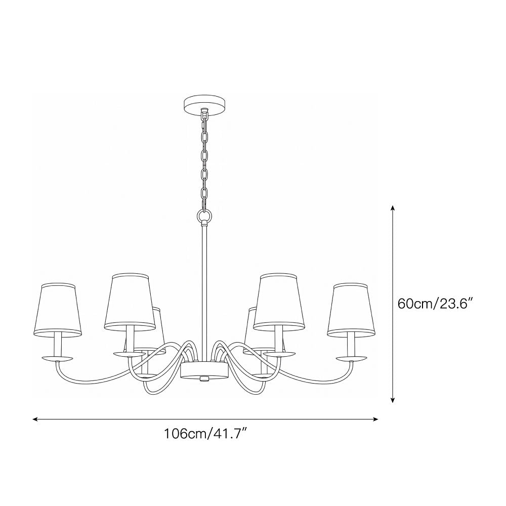 Close-up of the brass finish on the chandelier's curved arm.