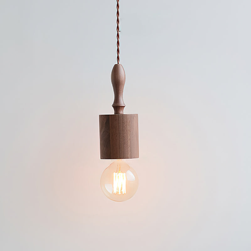The Cano Pendant Light illuminated, casting a warm glow.