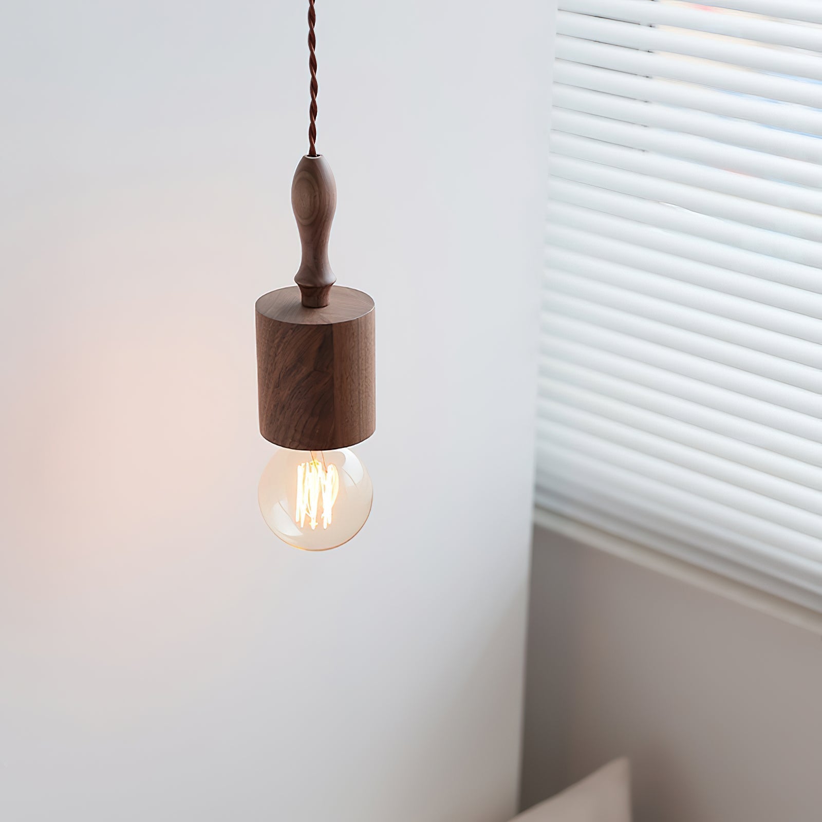 Cano Pendant Light in natural wood color, model B shape.