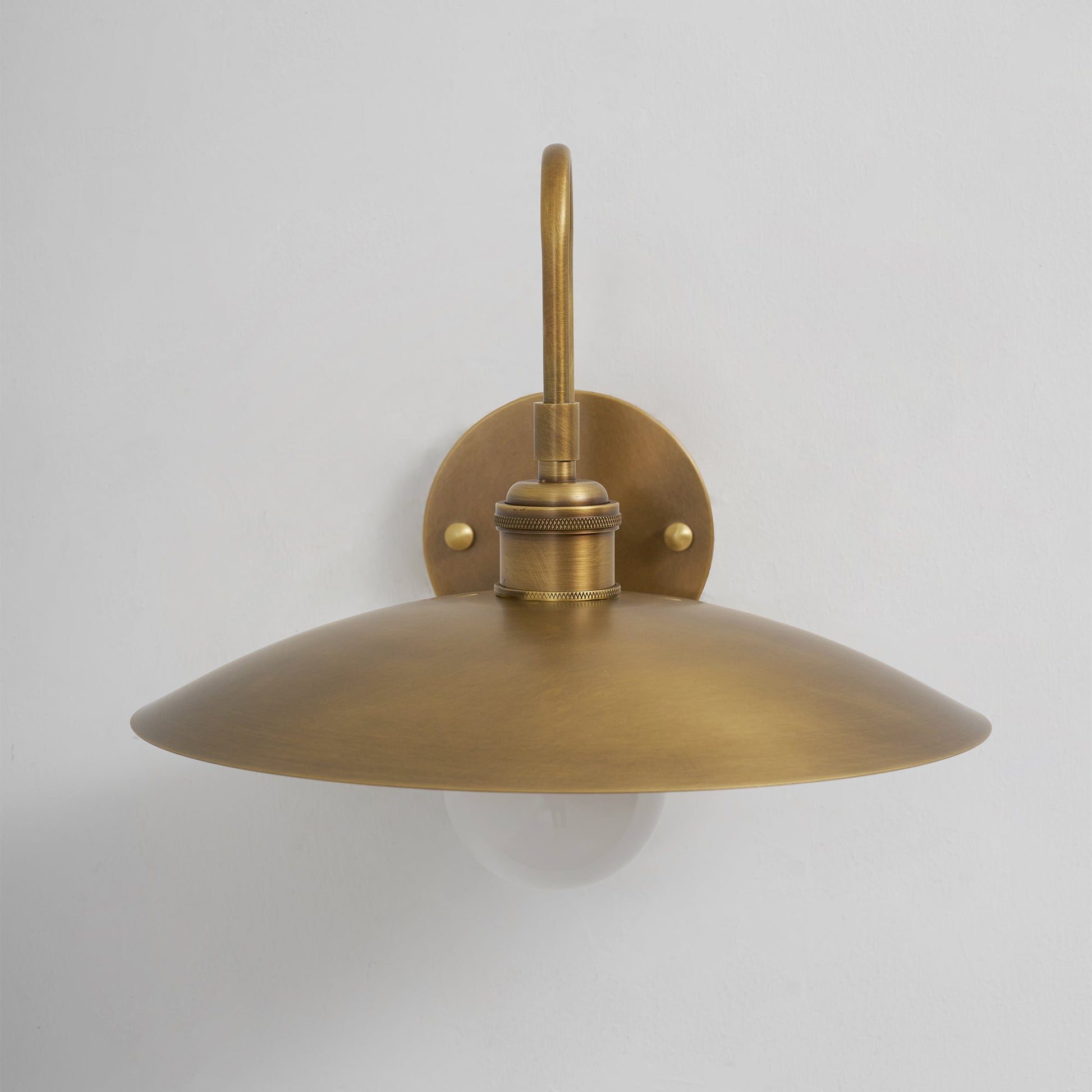 Cantina Wall Lamp shown with a vintage-style Edison bulb.