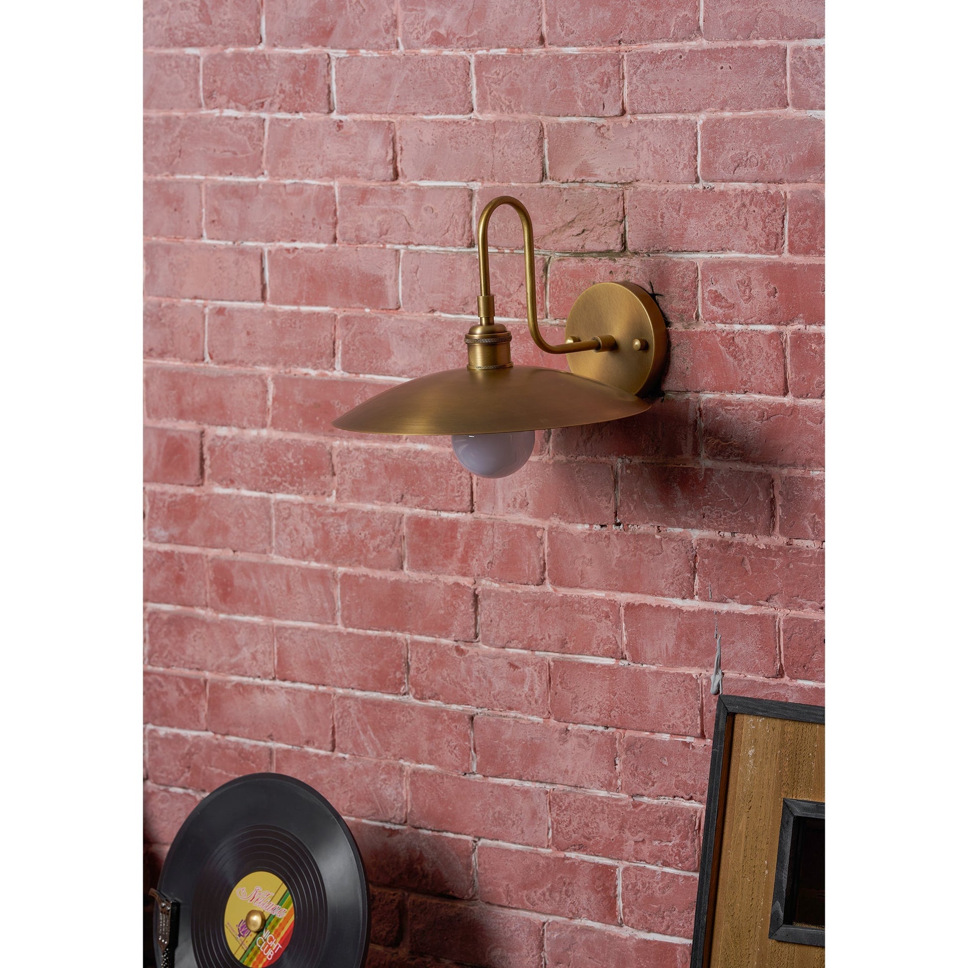 Cantina Wall Lamp installed in a hallway, providing ambient light.