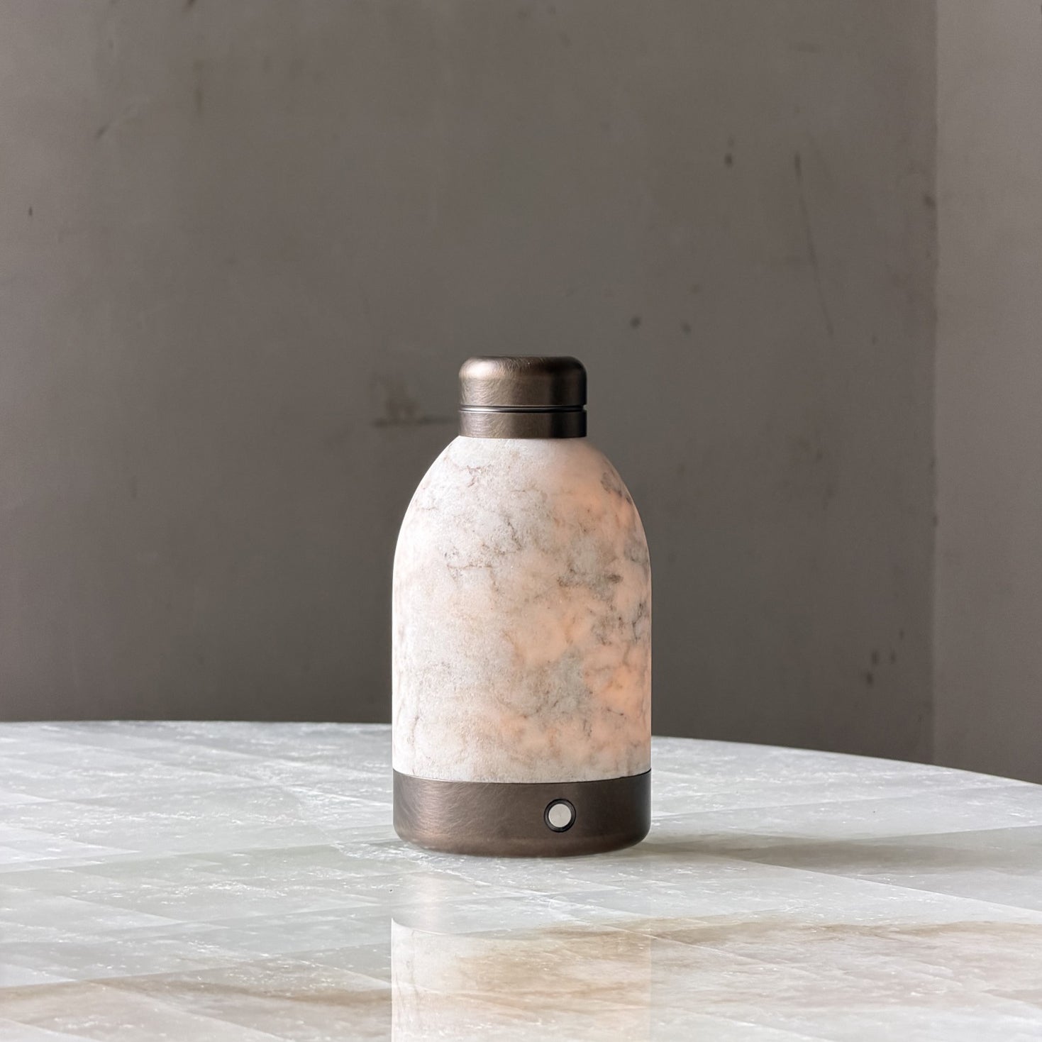 Side profile of the white table lamp.