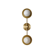 Cara Alabaster Wall Lamp with a sleek brass body shown against a plain background.