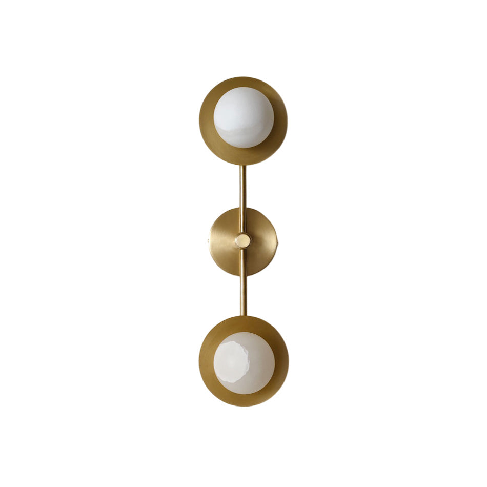 Cara Alabaster Wall Lamp with a sleek brass body shown against a plain background.