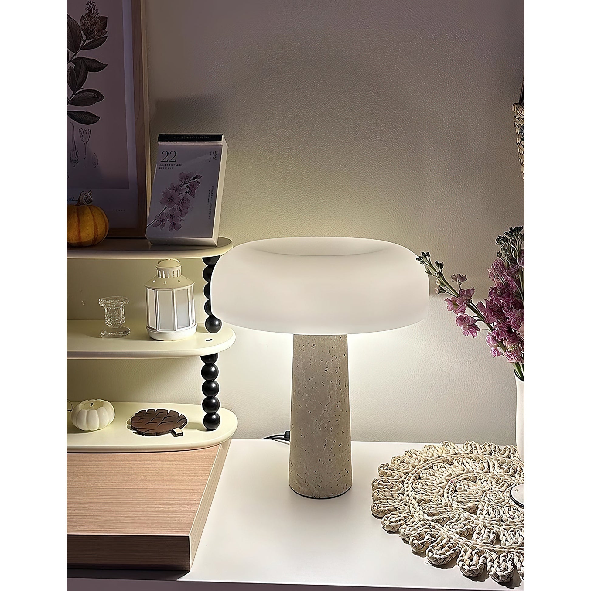 Lifestyle image of the lamp in a styled interior.
