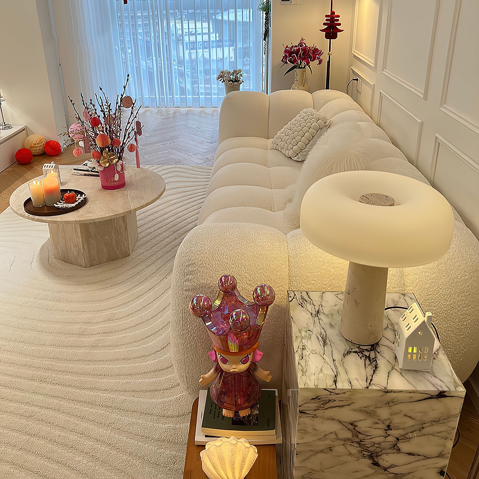 Carla Table Lamp placed on a bedside table in a bedroom setting.