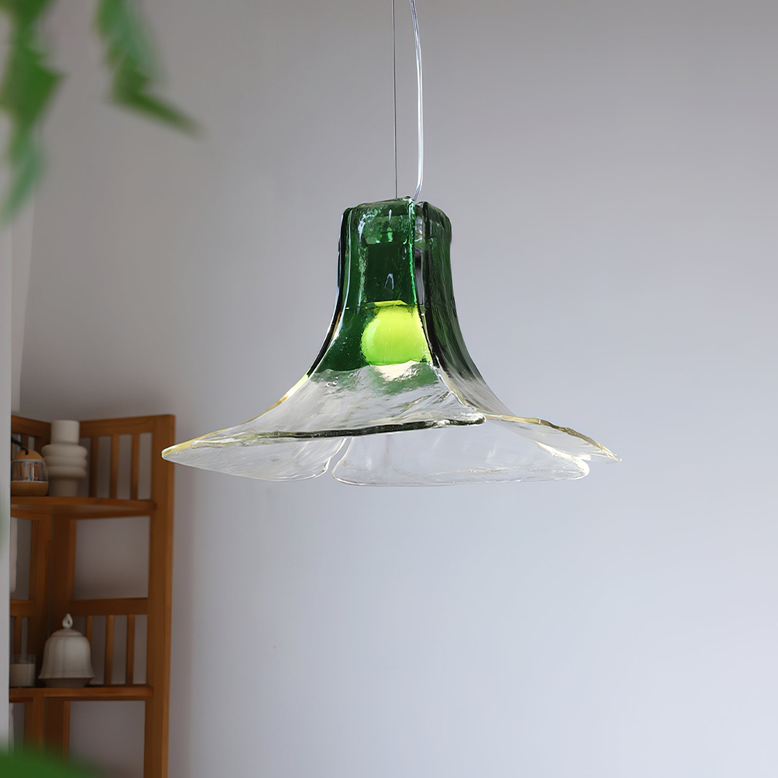 Side view of the Carlo Pendant Light showcasing its organic, fluid shape.