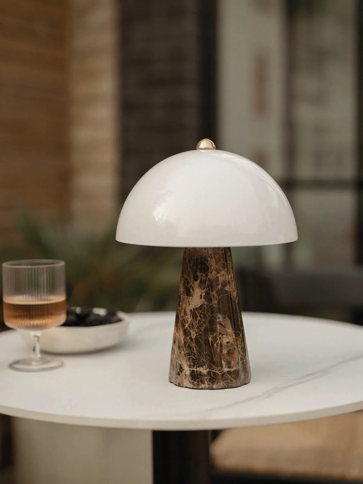 Side view of the Carme Table Lamp in brown marble.