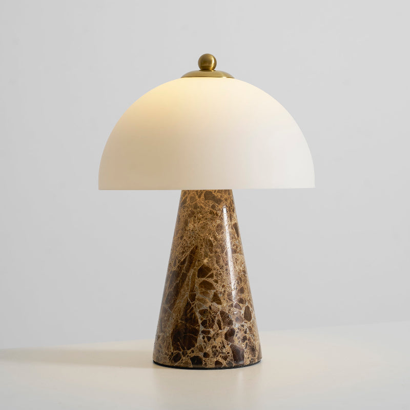 The lamp's soft glow illuminating a dark room.