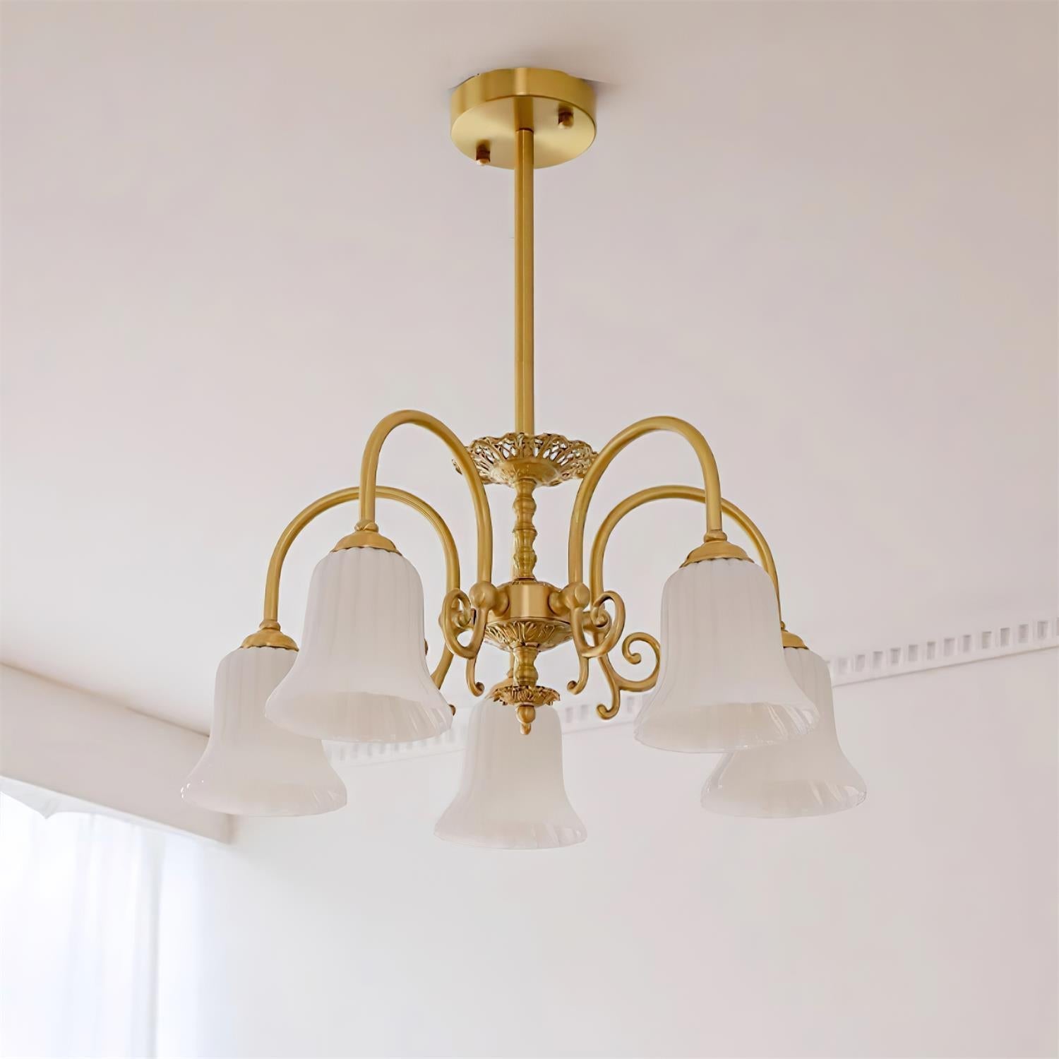 Chandelier with Brass Arms White Glass Shades Opulent Luxe