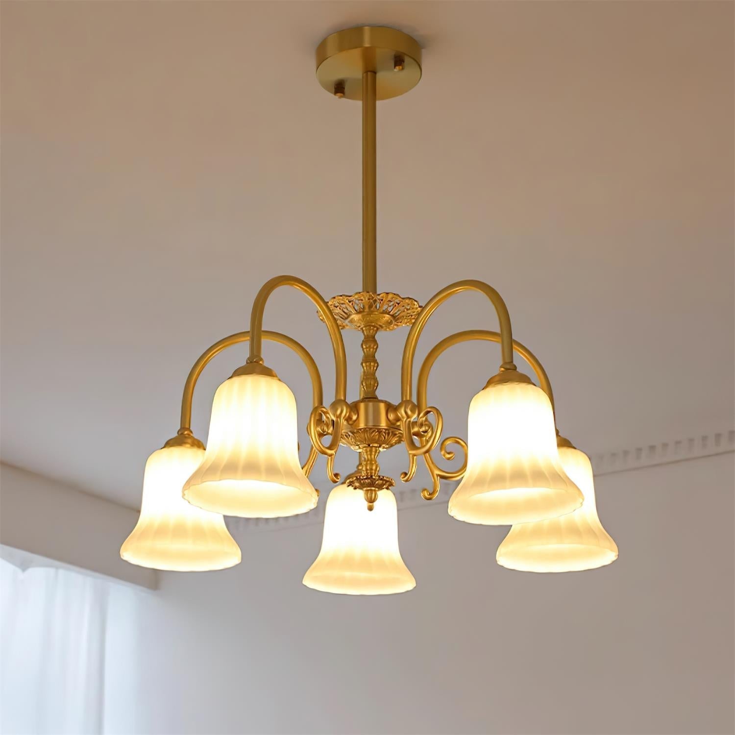 Chandelier with Brass Arms White Glass Shades Opulent Luxe
