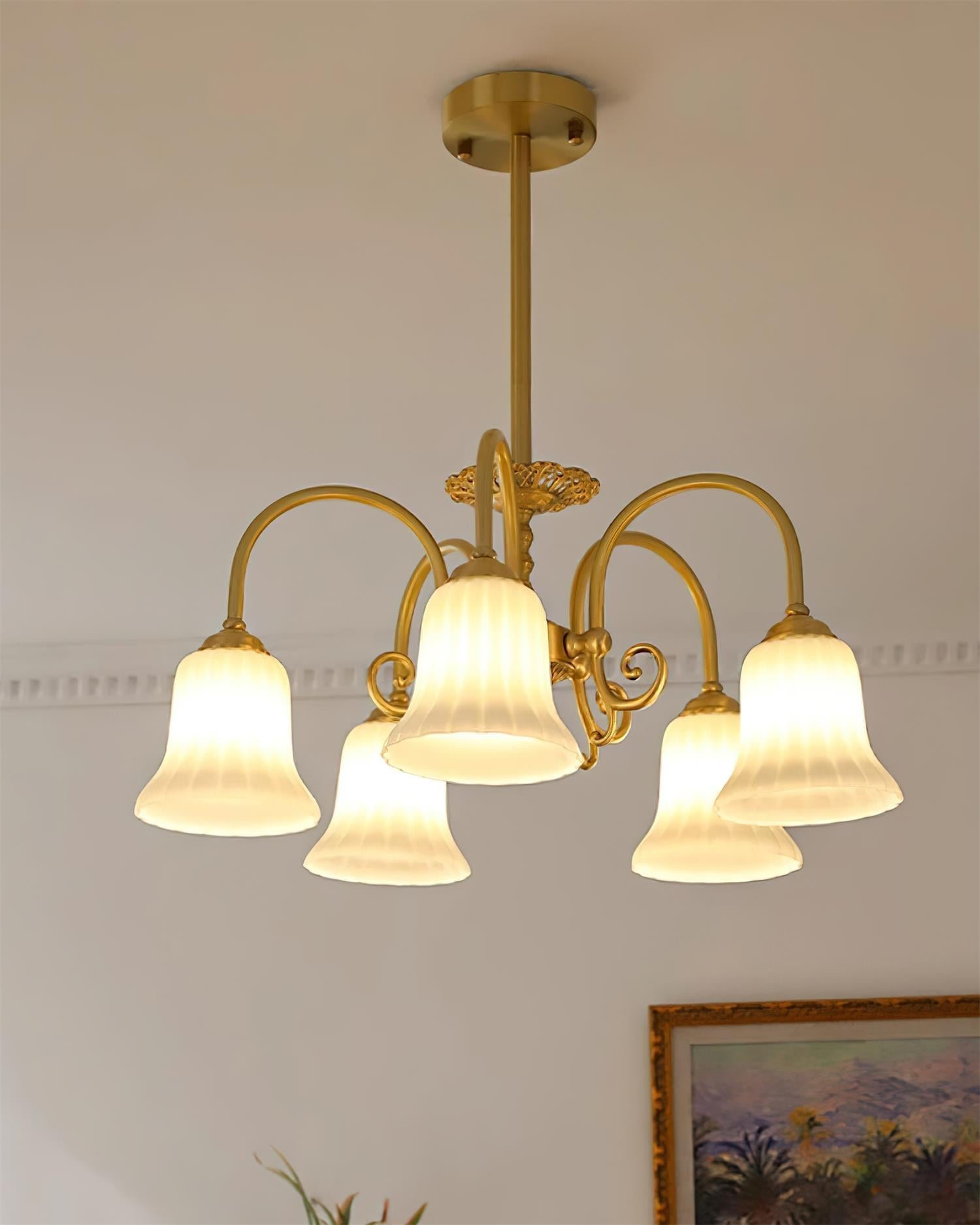 Chandelier with Brass Arms White Glass Shades Opulent Luxe