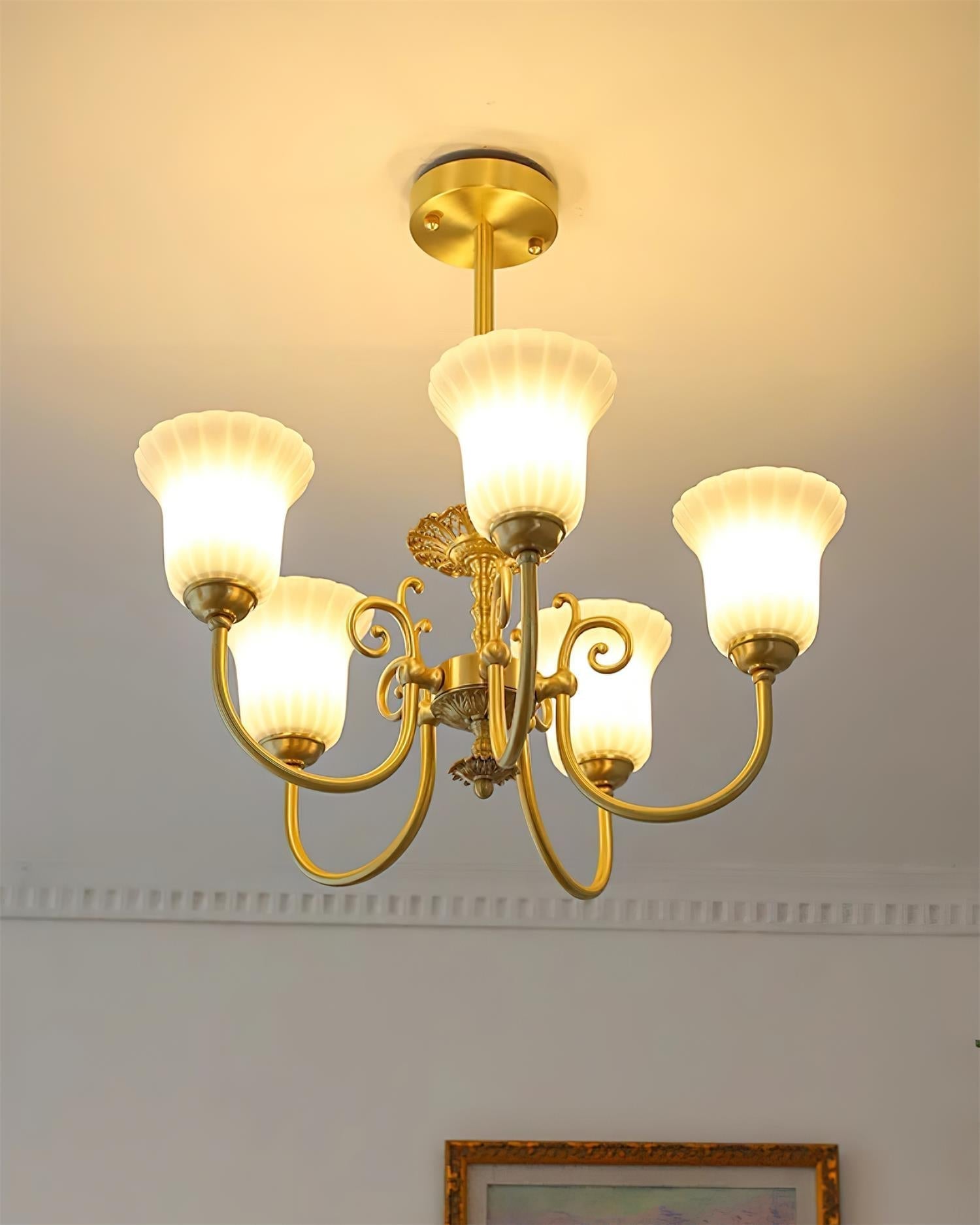 Chandelier with Brass Arms White Glass Shades Opulent Luxe