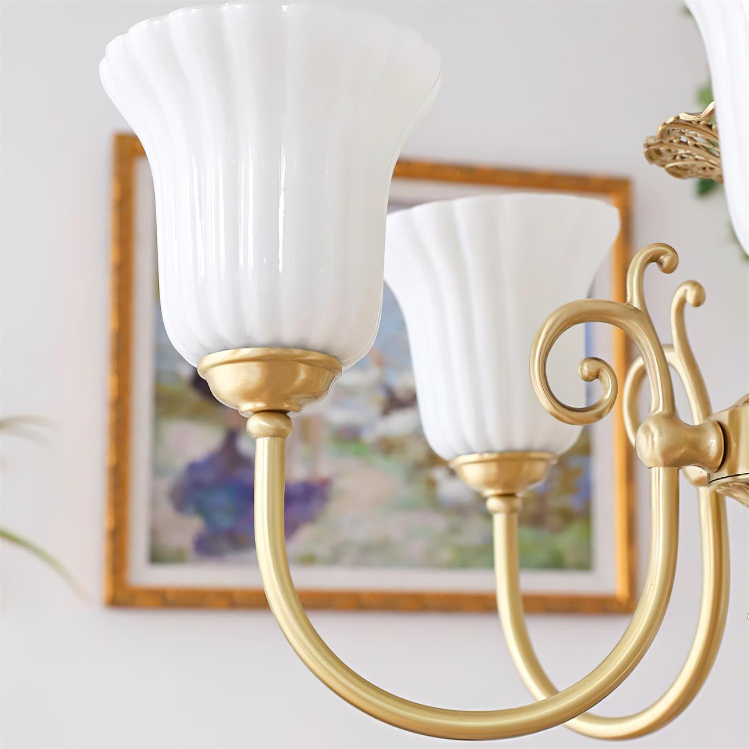 Chandelier with Brass Arms White Glass Shades Opulent Luxe