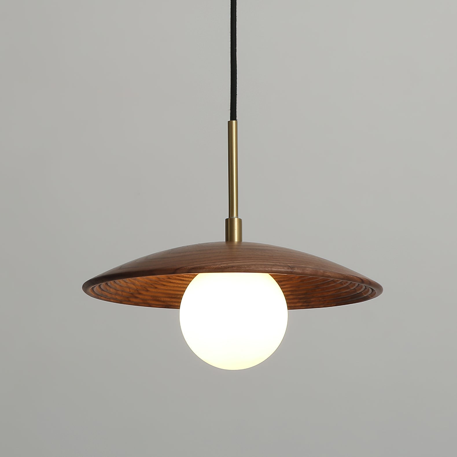 Caroll Pendant Light turned off, highlighting its material and craftsmanship.