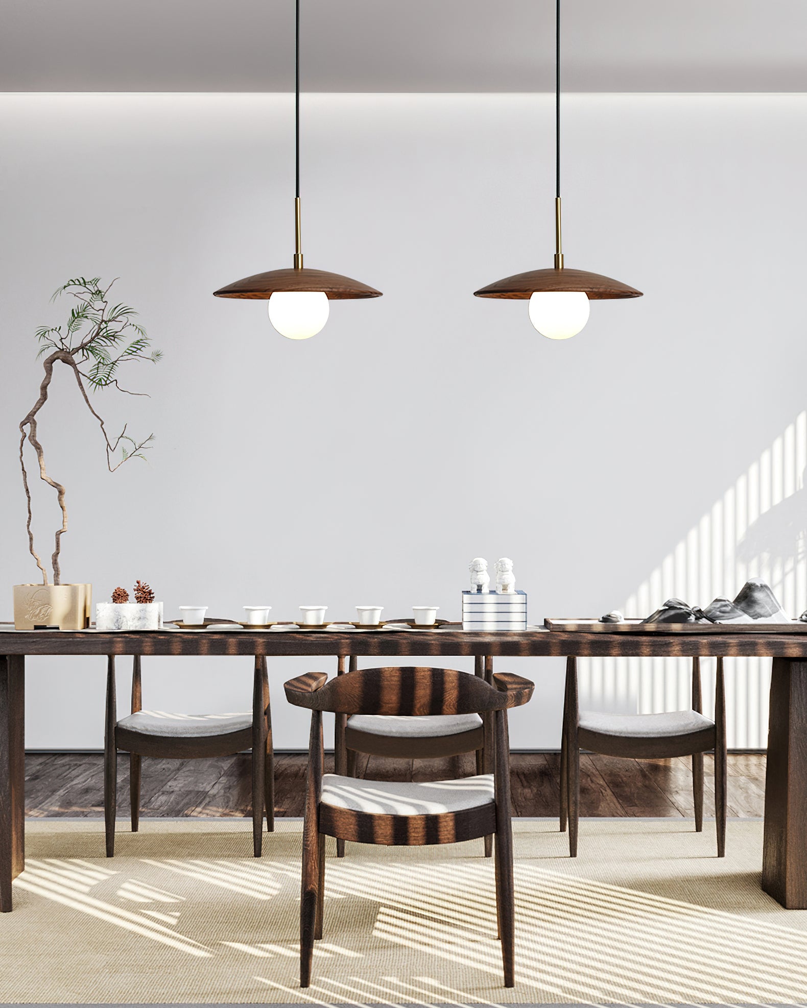 Angled view of the Caroll Pendant Light showing its sleek design.