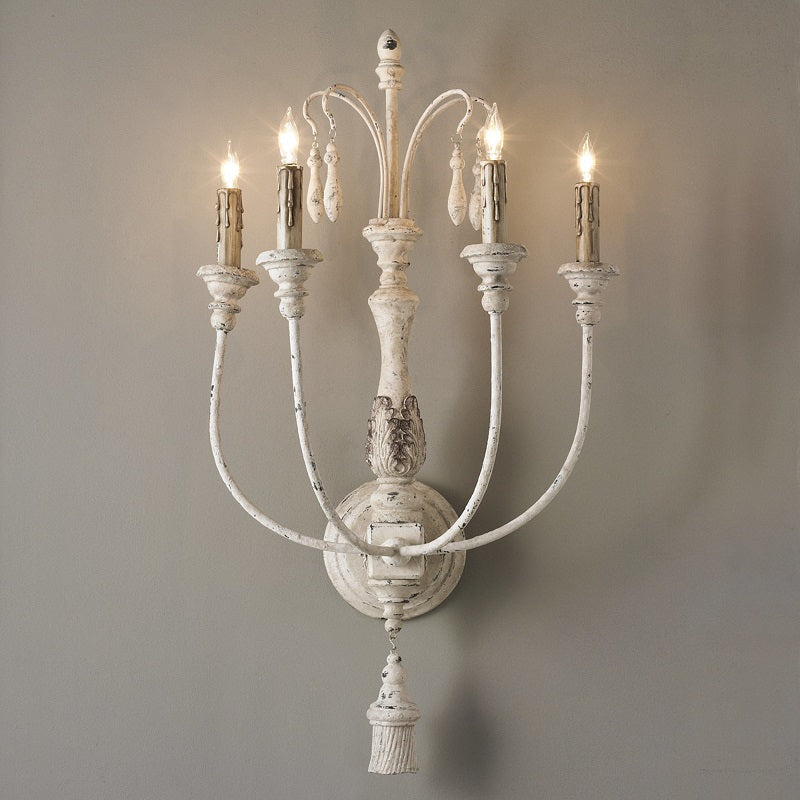 Angled view of the Cassell Candle Wall Lamp showcasing its four heads.