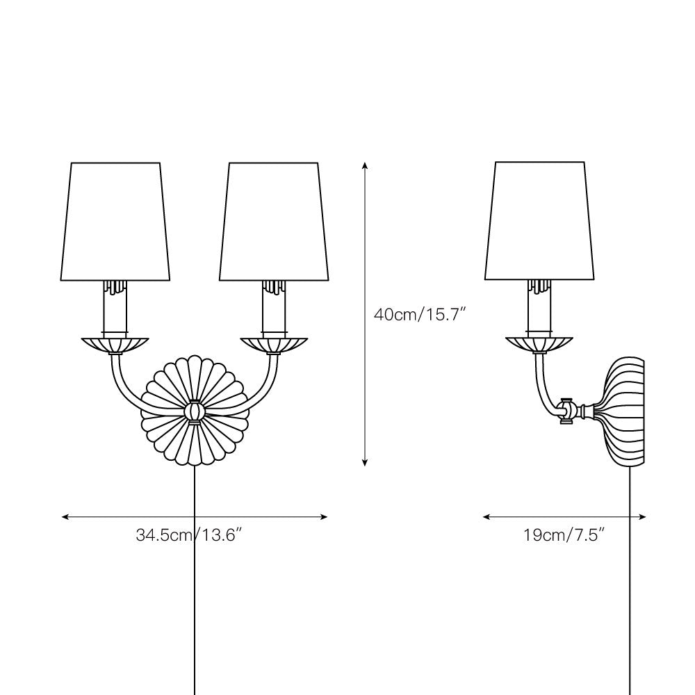 Single-arm vertical wall sconce with a cream fabric shade.