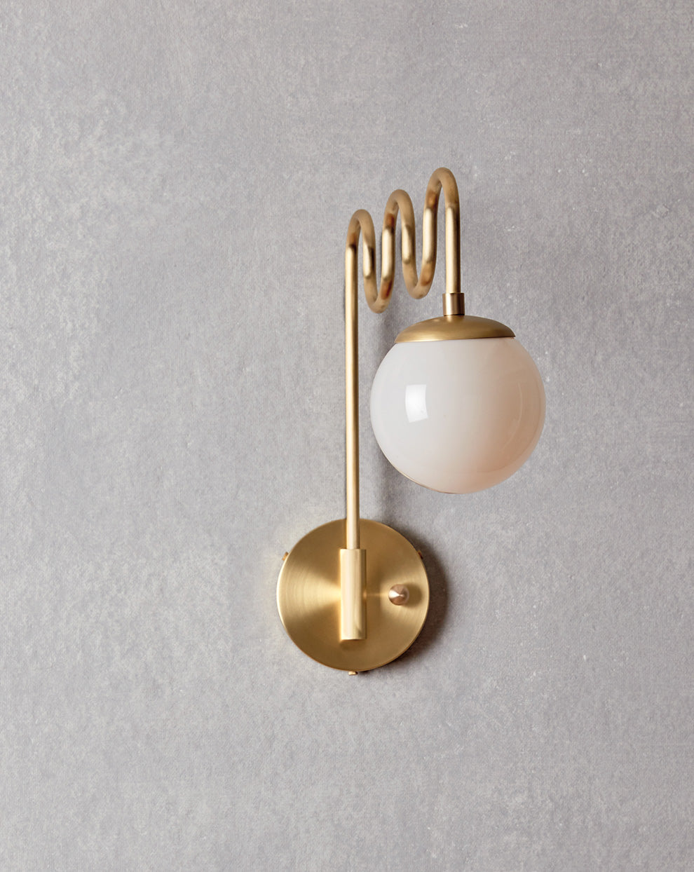 Comparison of the milk glass and clear glass globe options.