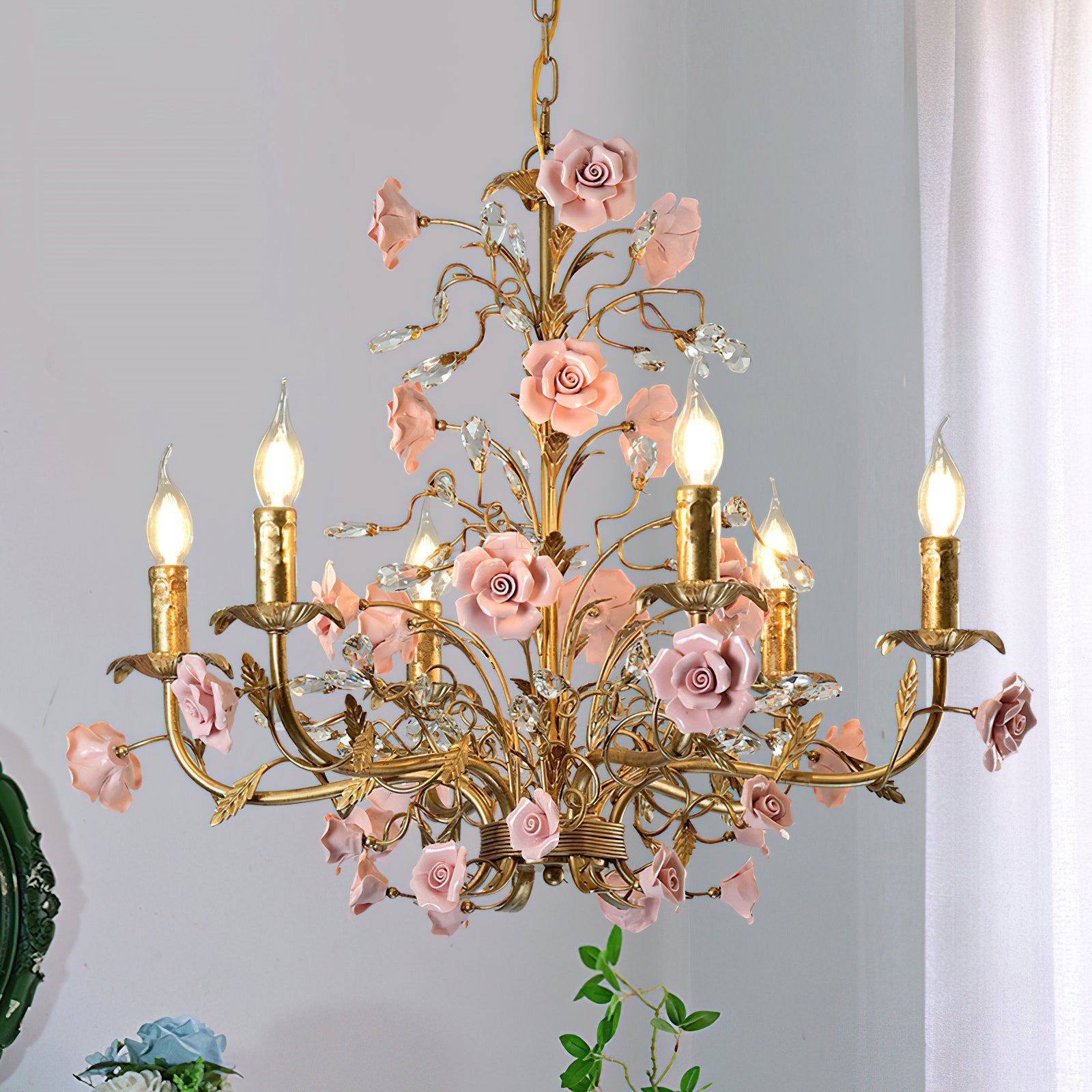 The 5-head version of the chandelier in a copper finish.