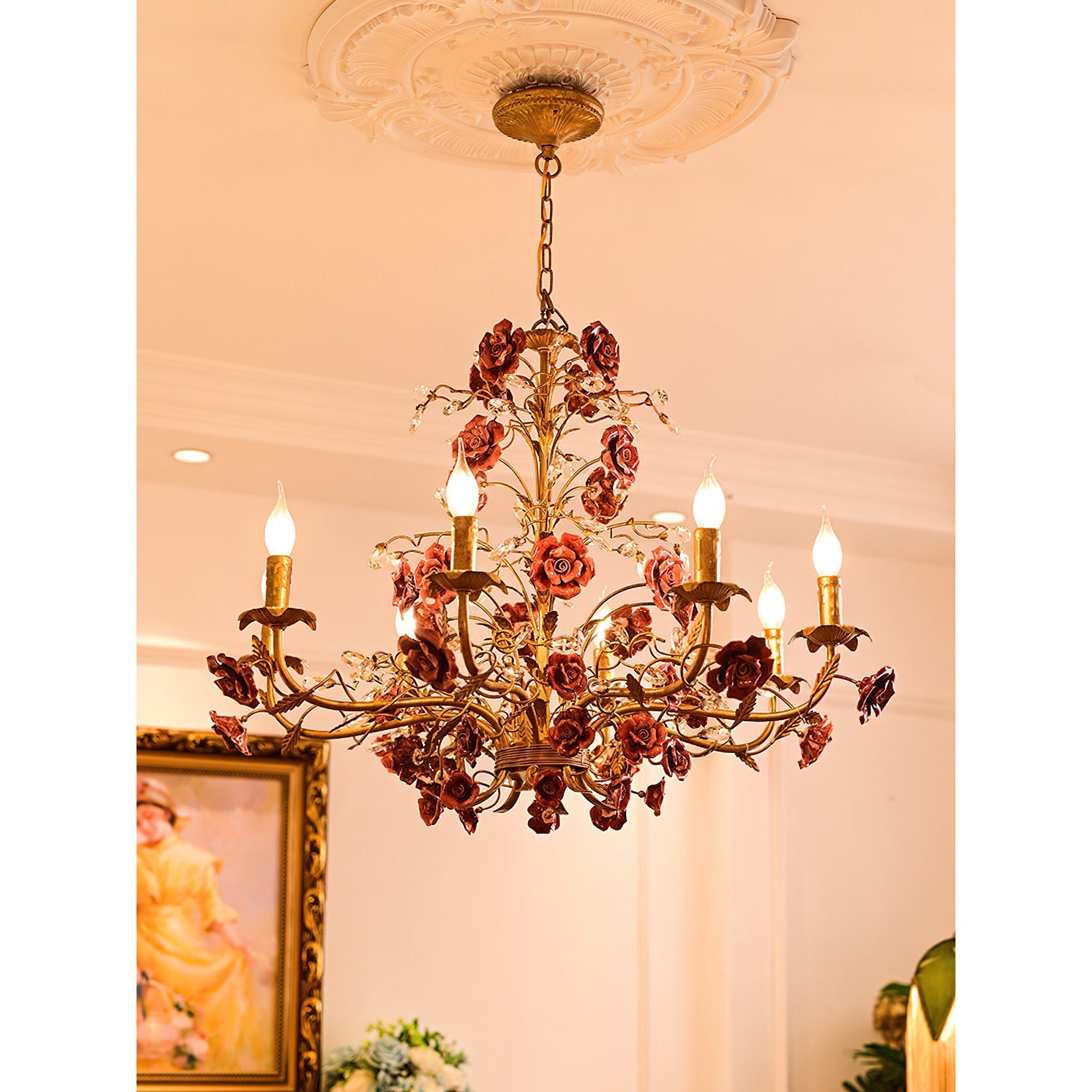 Lifestyle image of the chandelier in a chic living room.