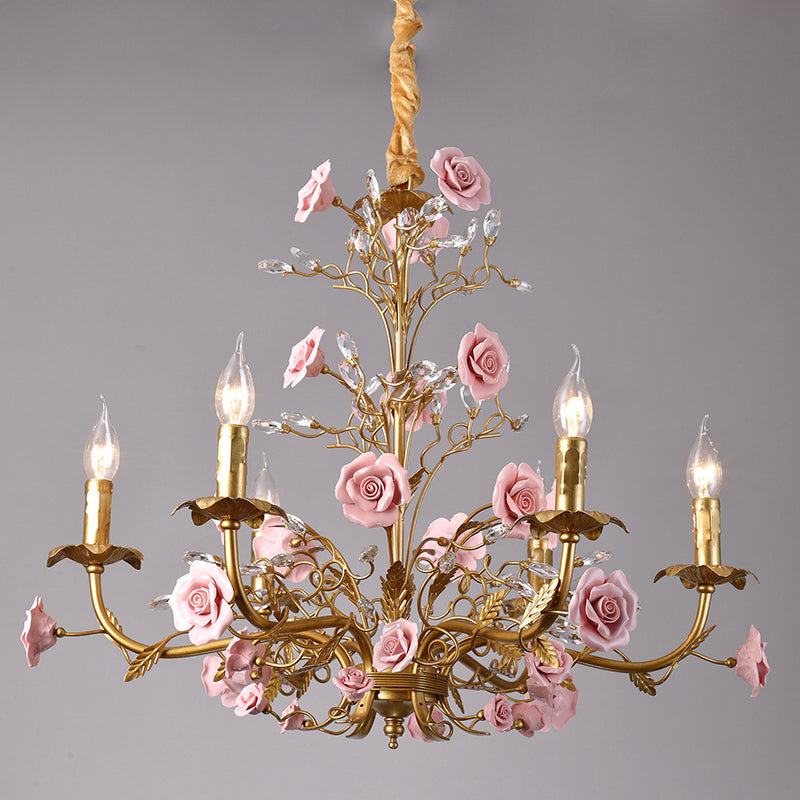Another angle showing the ceramic flowers and green leaves.