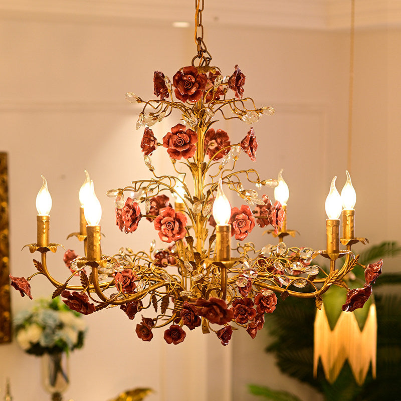 Close-up of the delicate ceramic roses and crystal accents.