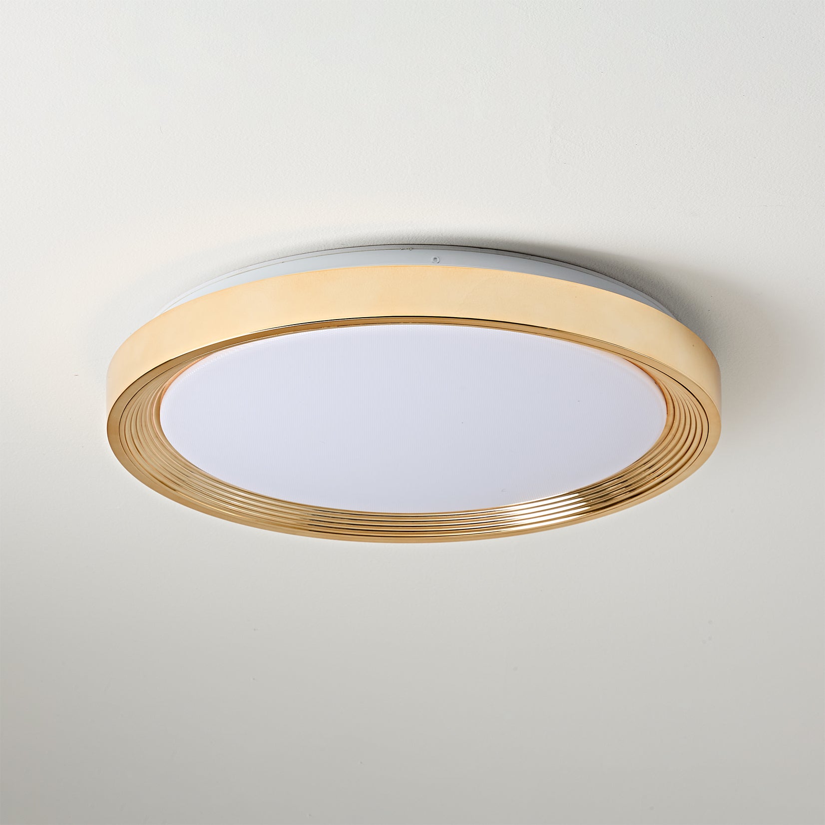Comparison of the four available finishes: walnut, white, gold, and cream.