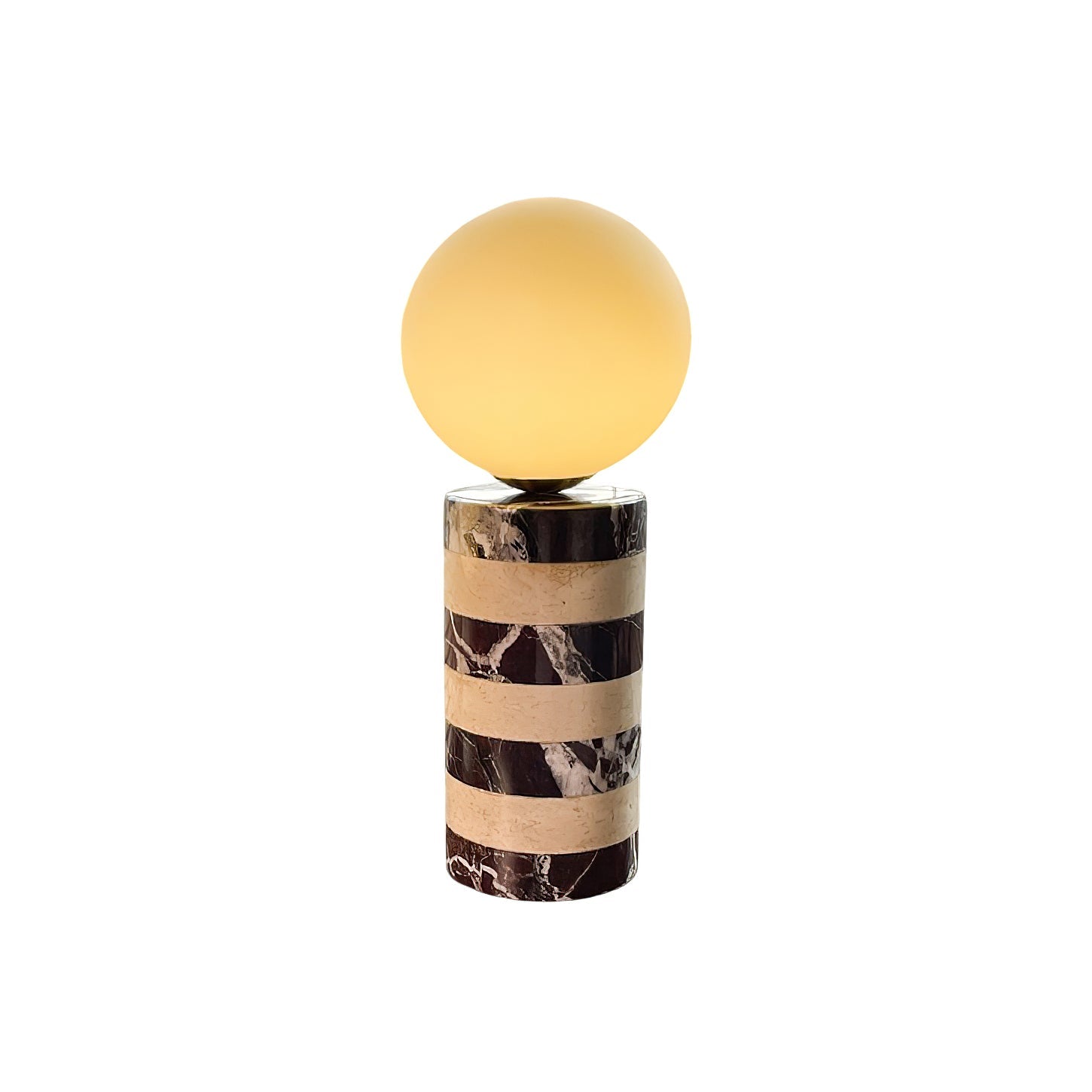 Charade Marble Table Lamp with a white base and glowing glass globe.