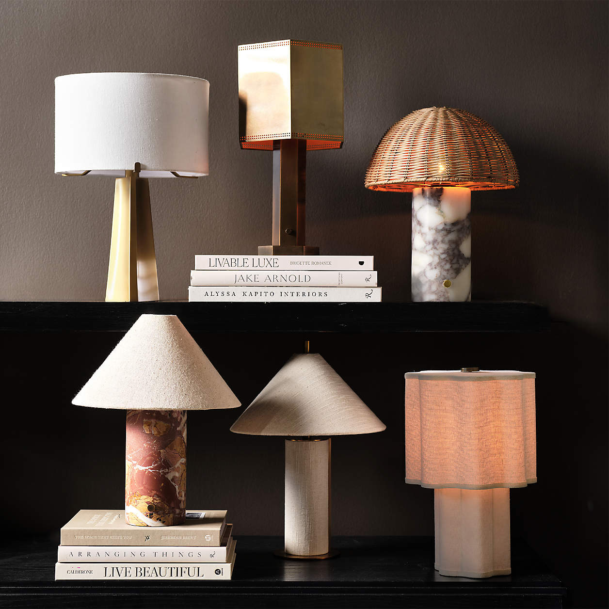 The lamp placed on a bedroom nightstand, providing soft reading light.