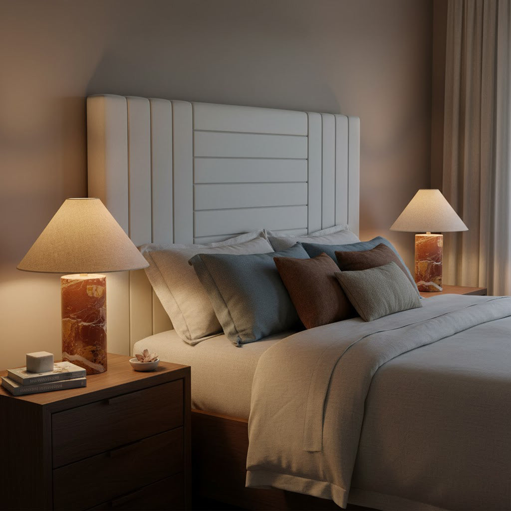 Chez Table Lamp styled on a living room side table next to a sofa.