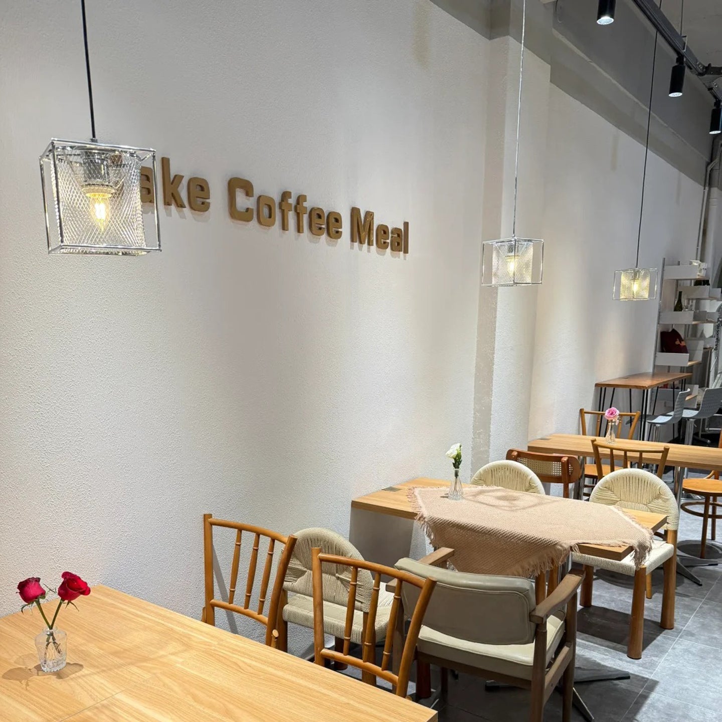 The Clarus Pendant Lamp shown over a bar area.