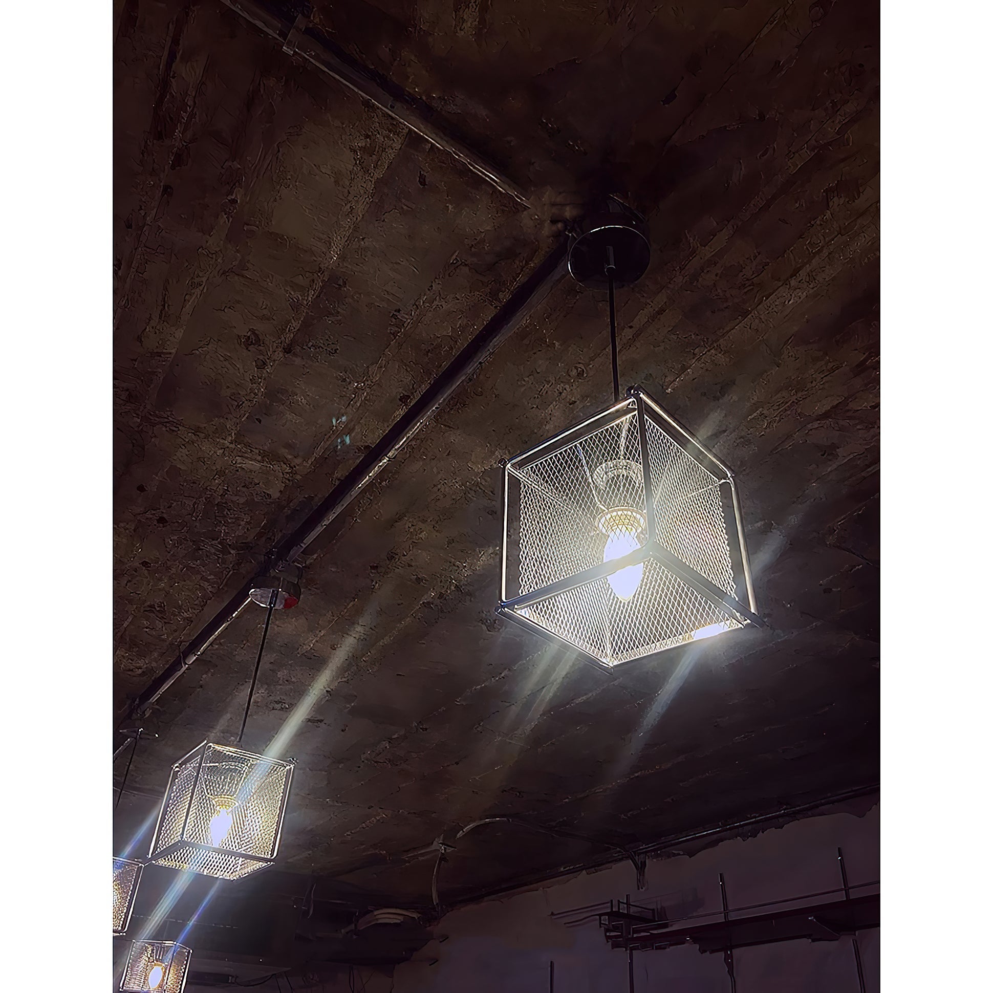 The lamp shown as a single fixture in a small room.