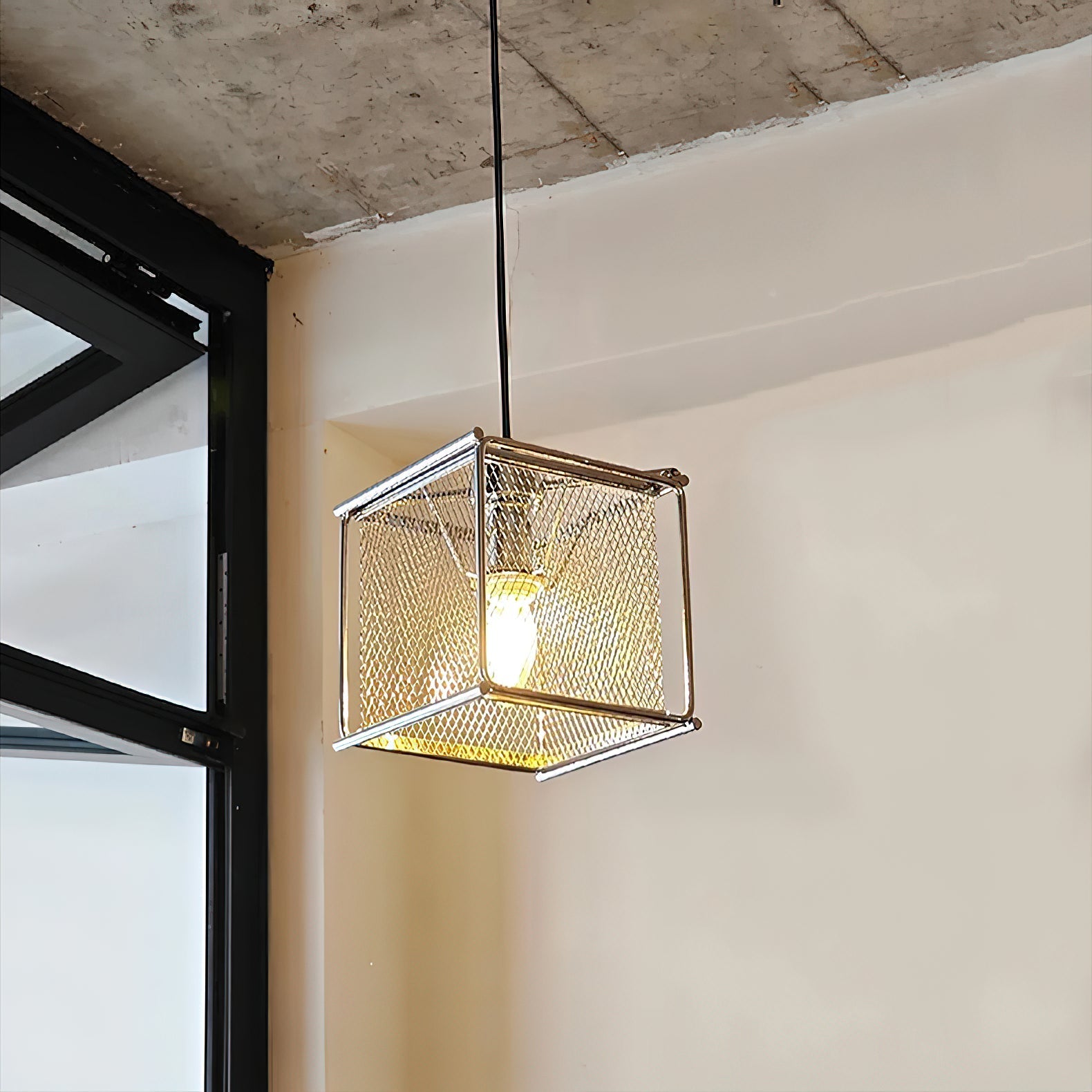 Top-down view of the Clarus Pendant Lamp's chrome finish.