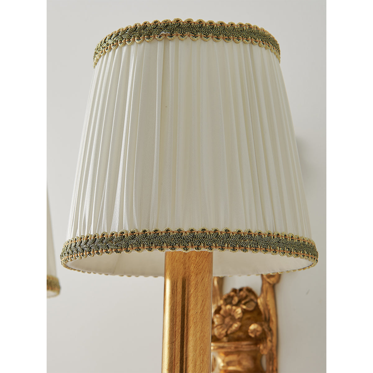 The Claudine Wall Lamp in a maximalist interior setting.