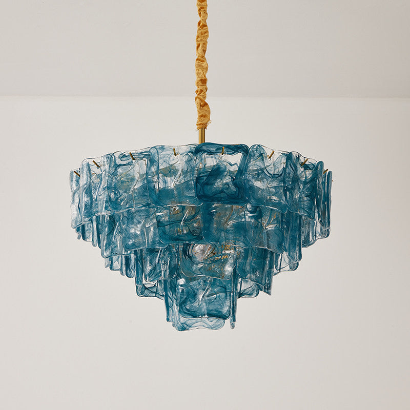 The chandelier shown unlit to highlight the intricate texture of the glass panels.