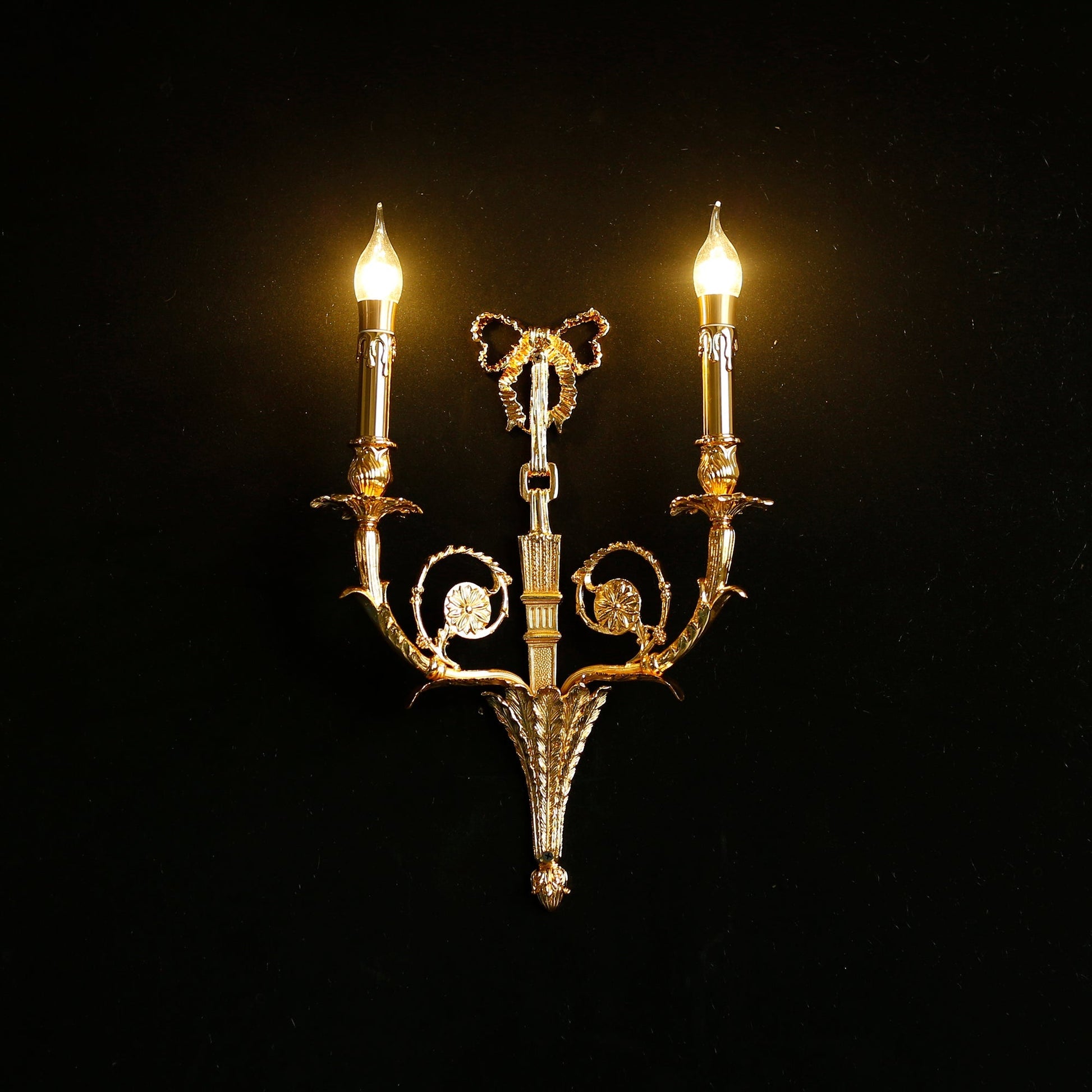 Backplate and hardwiring components of the Cleveland Wall Sconce.
