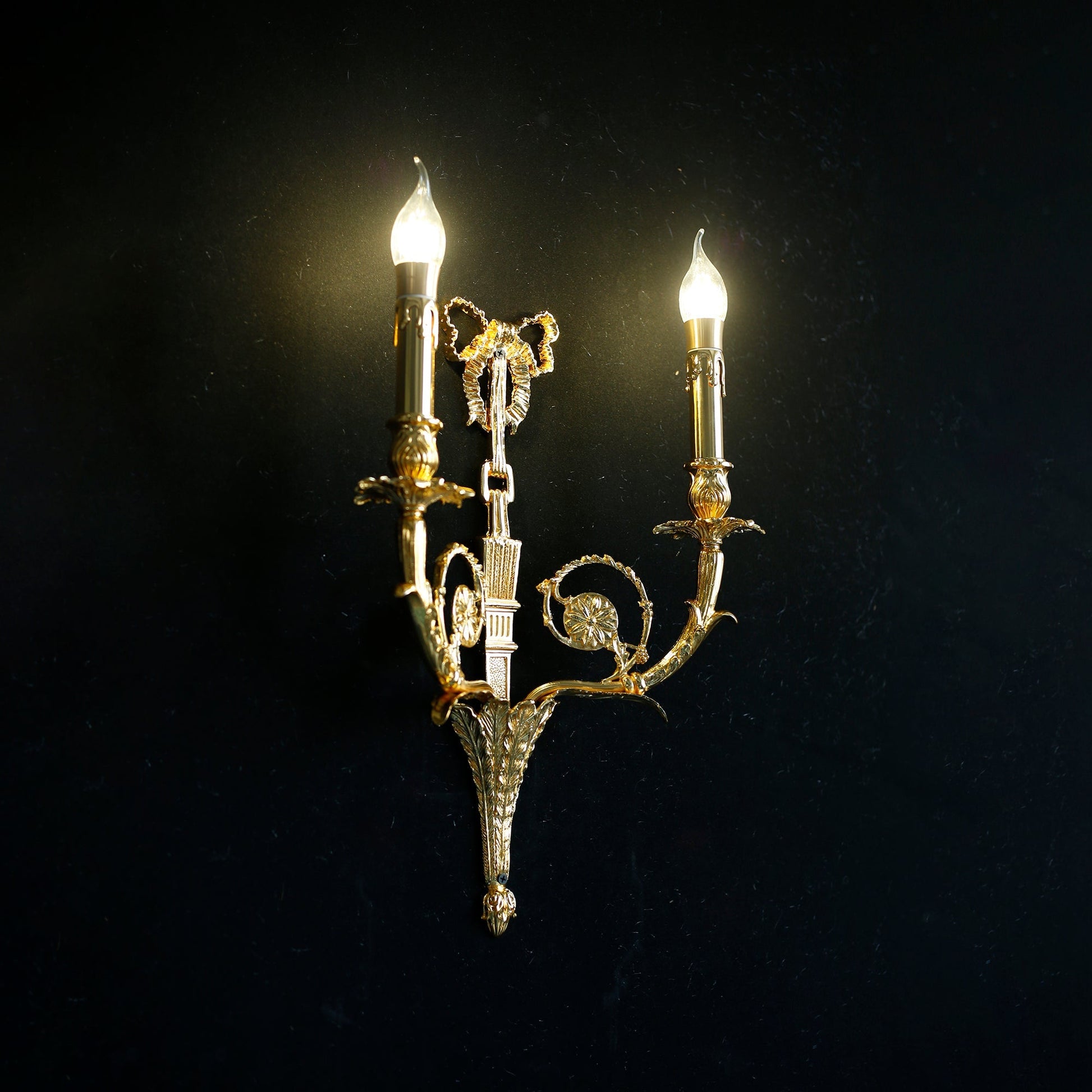 The Cleveland Wall Sconce in a Hollywood Regency style living space.