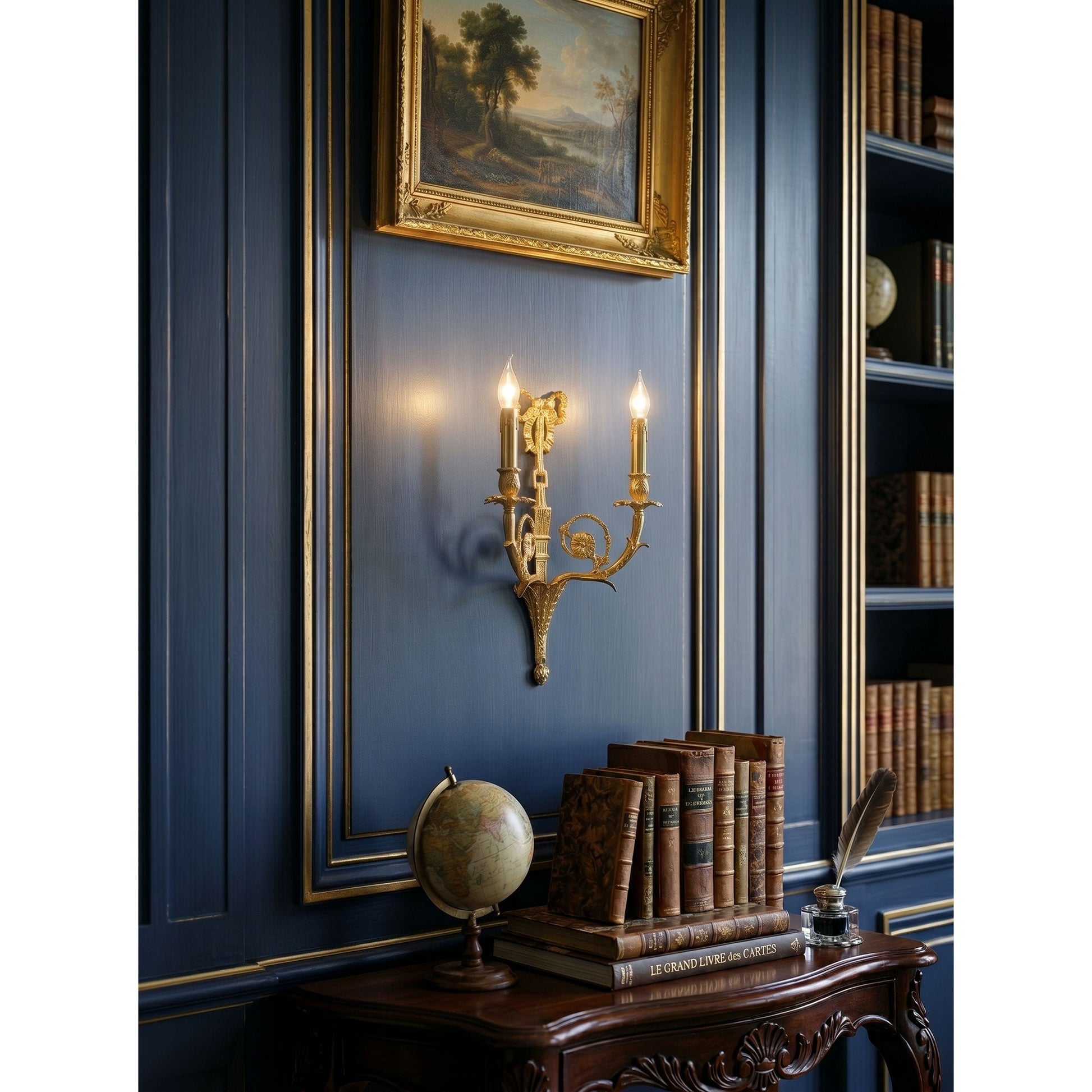 A pair of Cleveland sconces flanking a mirror in a powder room.
