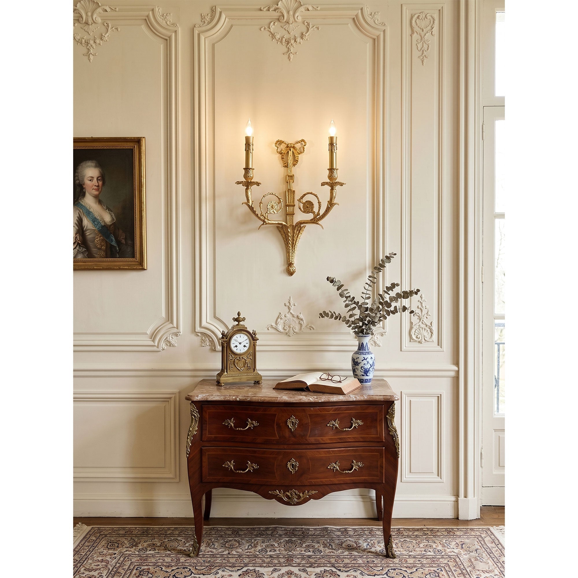 The warm glow from the Cleveland Brass Wall Sconce in an entryway.