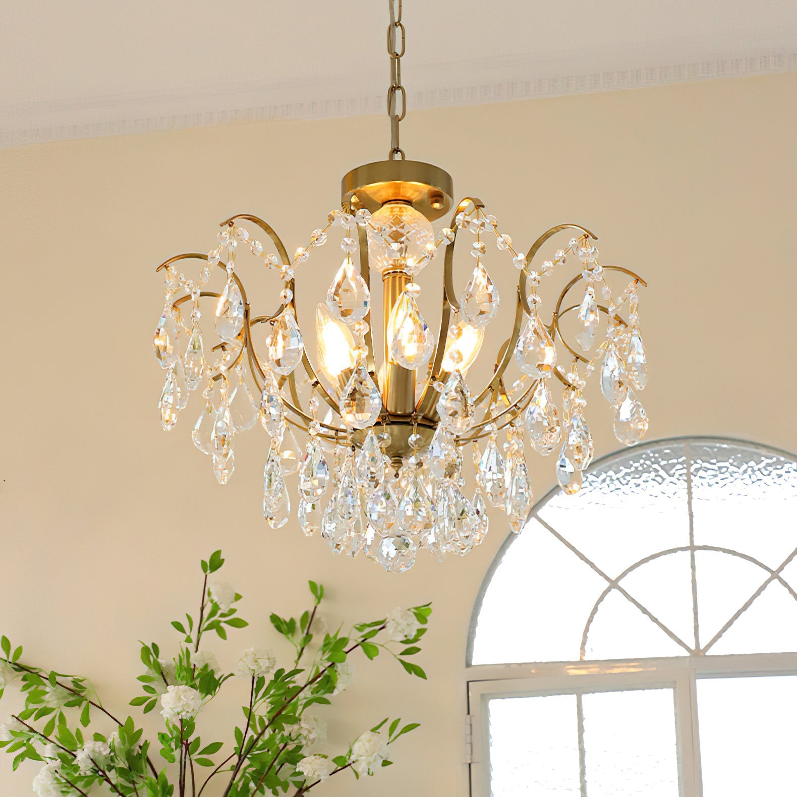 Angled view showcasing the chandelier's feminine silhouette.