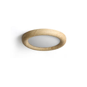 Concise ceiling light in beige stone mixture, shown against a neutral wall.