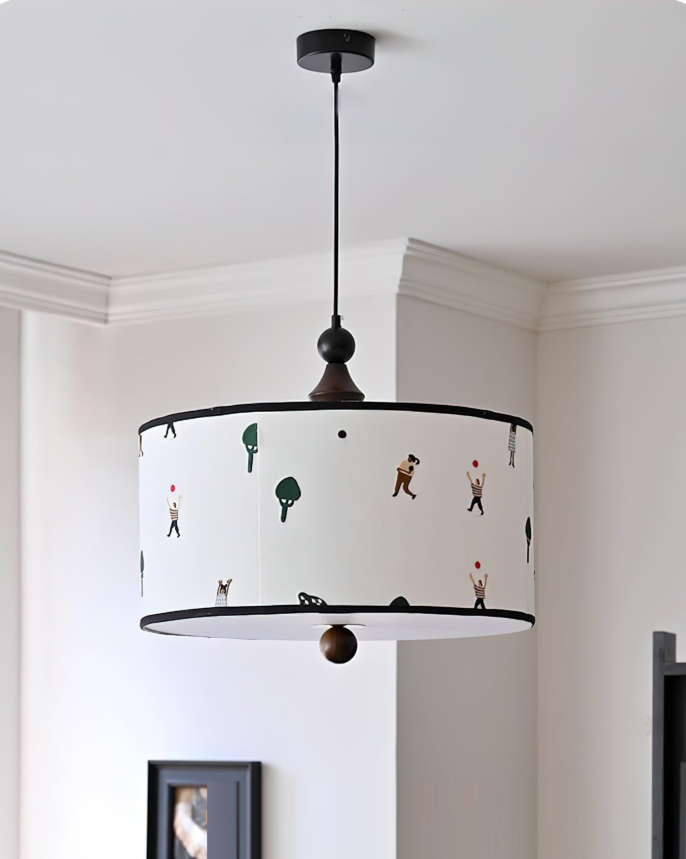 Congo Pendant Light shown hanging in a child's bedroom setting.