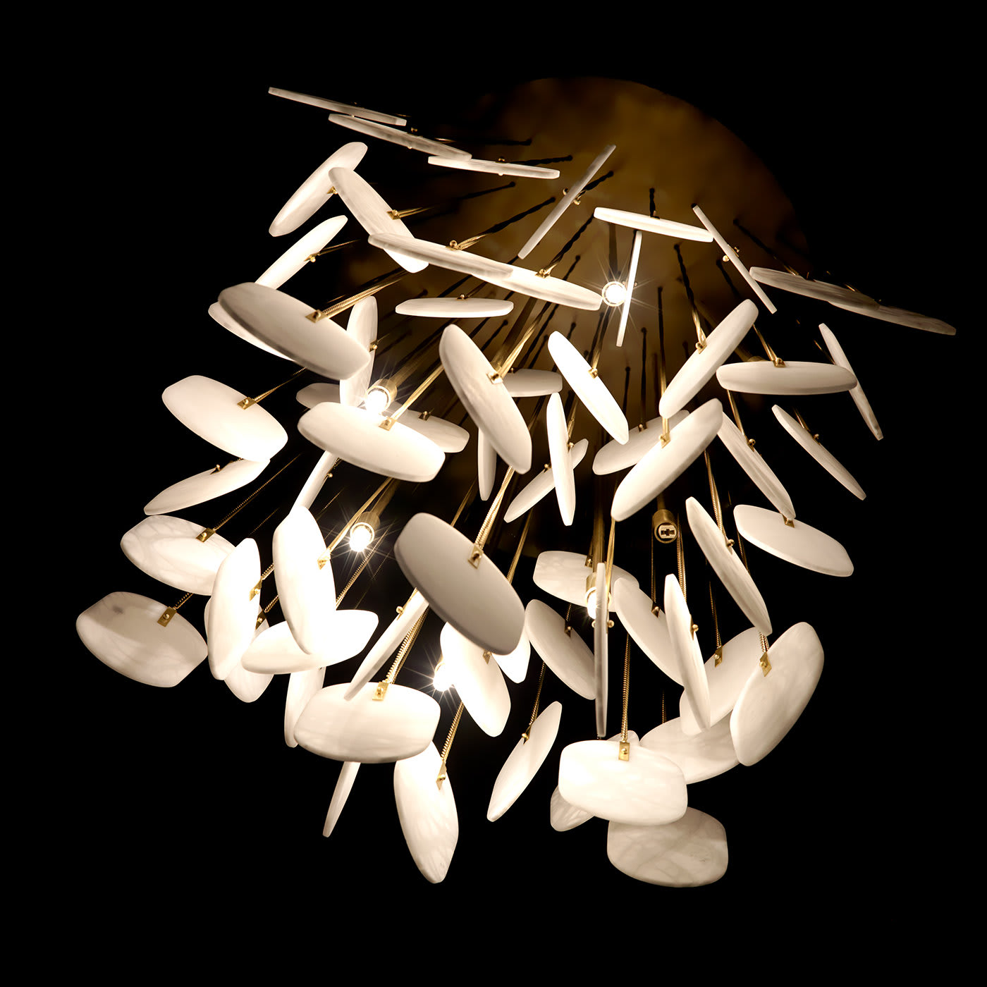 View of the chandelier from a second-story landing looking down.